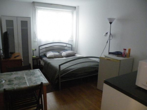 Grande chambre privée avec toilette partagée